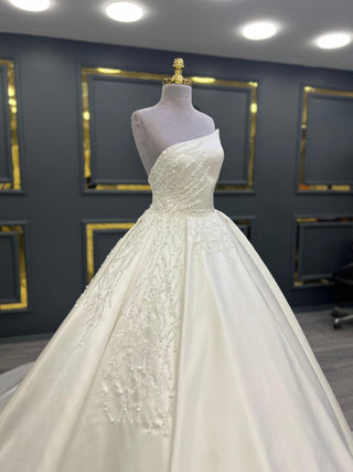 Opulent Off-Shoulder Beaded Satin Ball Gown with Cascading Embellishments and Grand Train