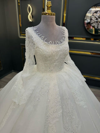 Opulent Long-Sleeve Beaded Ball Gown with Intricate Embroidery