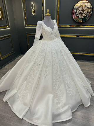 Opulent Ball Gown with Intricate Beaded Appliques, Sheer Sleeves, and Deep V-Neckline