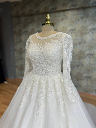 Elegant Ball Gown with Floral Lace Appliques, Illusion Neckline, and Long Sheer Sleeves