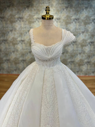 Elegant Ball Gown with Draped Bodice and Beaded Embellishments