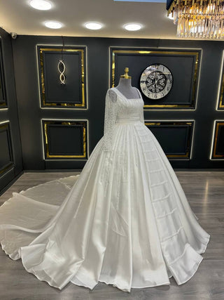 Elegant Princess Wedding Gown with Beaded Stripes and Embellished Long Sleeves