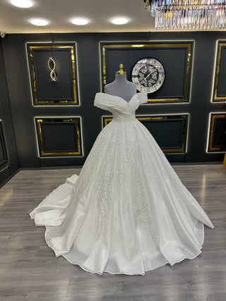 Opulent Off-the-Shoulder Wedding Gown with Exquisite Beaded Details