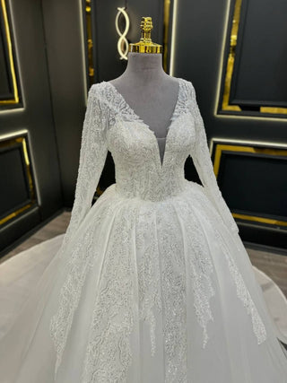 Elegant Long Sleeve Lace Wedding Dress with Deep V-Neck and Glittering Appliques