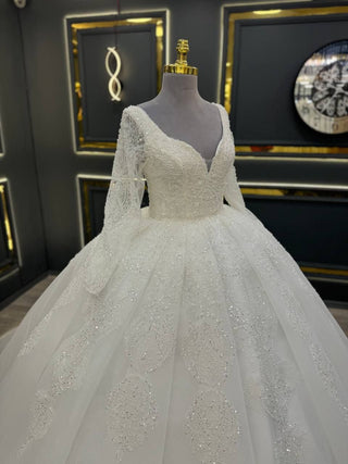 Exquisite Long Sleeve Wedding Dress with Plunging Sweetheart Neckline and Beaded Lace Appliques