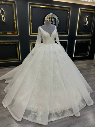 Exquisite Long Sleeve Wedding Dress with Plunging Sweetheart Neckline and Beaded Lace Appliques