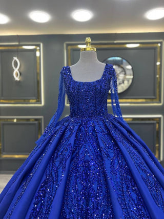 Exquisite Royal Blue Beaded Ball Gown with Long Sheer Sleeves and Square Neckline