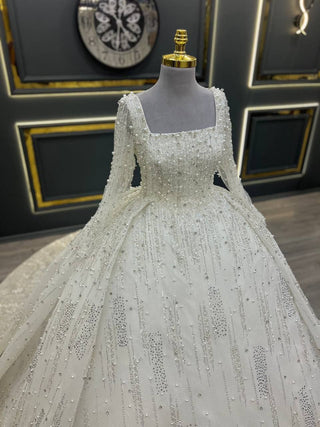 Exquisite Royal Pearl-Encrusted Ball Gown with Cape and Beaded Embellishments