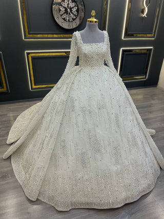 Exquisite Royal Pearl-Encrusted Ball Gown with Cape and Beaded Embellishments