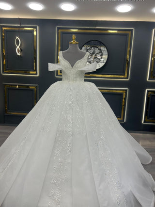 Regal Beaded Off-Shoulder Ball Gown Wedding Dress with Intricate Appliques