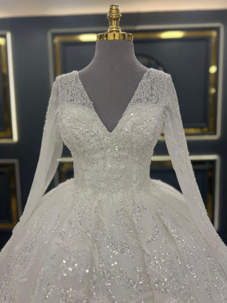 Majestic Long-Sleeve Beaded Ball Gown Wedding Dress with V-Neck and Intricate Appliques