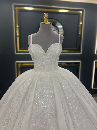 Opulent Strapless Beaded Ball Gown Wedding Dress with Sparkling Embellishments