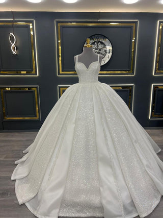 Opulent Strapless Beaded Ball Gown Wedding Dress with Sparkling Embellishments