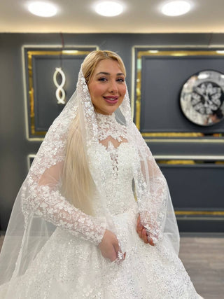 Opulent Lace Long Sleeve Wedding Gown with High Neck and Intricate Veil