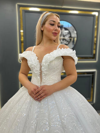 Enchanting Off-the-Shoulder Ball Gown Wedding Dress with Ruffled Neckline and Beaded Bodice