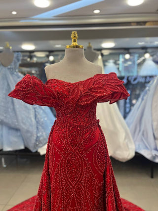 Opulent Ruby Red Beaded Gown with Dramatic Off-Shoulder Ruffles