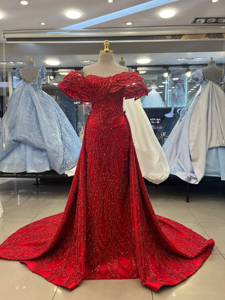 Opulent Ruby Red Beaded Gown with Dramatic Off-Shoulder Ruffles