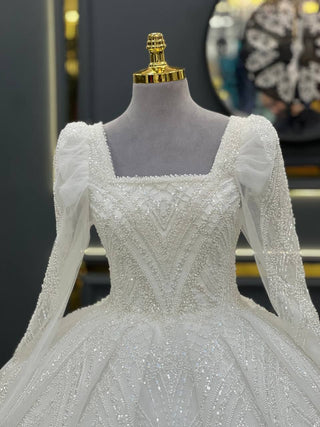 Regal Beaded Ball Gown Wedding Dress with Square Neckline and Elegant Long Sleeves