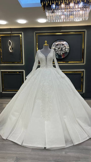 Regal Embroidered Ball Gown with Deep V-Neckline and Long Sleeves