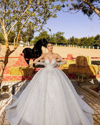 Strapless Beaded Ballgown with Intricate Crystal Detailing and Sheer Gloves