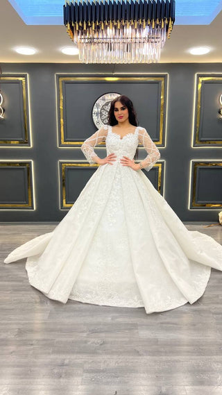 Elegant Wedding Gown with Beaded Long Sleeves and Flared Skirt