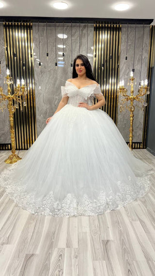 Enchanting Off-the-Shoulder Ball Gown with Beaded Bodice and Full Tulle Skirt