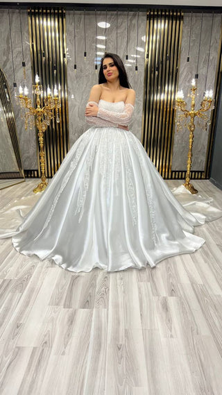 Elegant Strapless A-Line Gown with Beaded Bodice and Sheer Long Sleeves