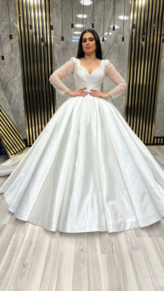 Classic Beaded Ball Gown with Sheer Long Sleeves and Satin Skirt