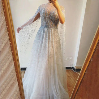 Luxury Silver Beaded Dubai Evening Dress with Cape Sleeves: Arabic Long Formal Party Dress for Women's Wedding