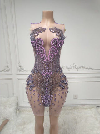 Elegant Beaded Mini Dress with Sheer Panels and Intricate Detailing