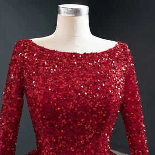 Radiant Elegance: Designer Long Sleeve Evening Dress with Sequins and Feathers