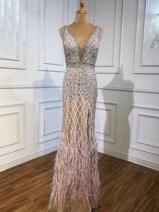 Elegant Nude Pink Mermaid Evening Dress - High Split, Luxury Feathers, and Beaded Details for Women's Party 2024