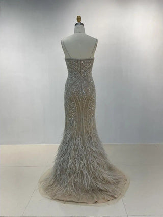 2024 Champagne Stunning Slip V-Neck Mermaid Gown - Luxury Beaded Feathers Evening Dress for Wedding Guests