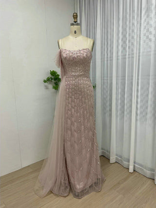 Luxurious Off-Shoulder Pink Mermaid Evening Dress - Beaded Tassel Gown with Spaghetti Straps and Side Train for Wedding Parties