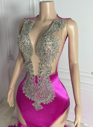 Vibrant Pink Embellished Gown with Feathered Train and Side Cutouts