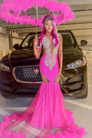 Vibrant Pink Embellished Gown with Feathered Train and Side Cutouts