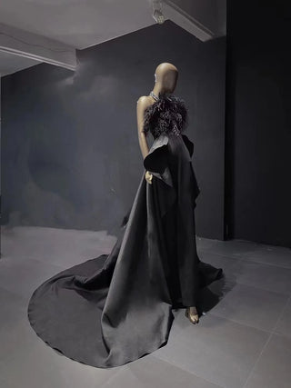 QUEENS DUBAI: Enchanting Elegance - Black Halter Costume Dress with Ostrich Feather Accents for a Fashion Show Evening