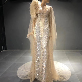 QUEENS DUBAI: Mesmerizing Elegance - Mermaid Champagne Sequins Beaded Ostrich Feather Costume Show Dress