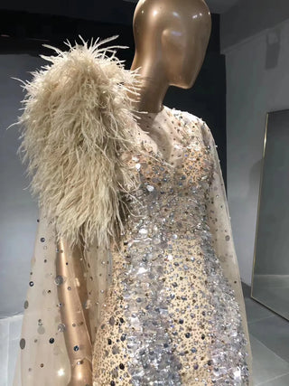 QUEENS DUBAI: Mesmerizing Elegance - Mermaid Champagne Sequins Beaded Ostrich Feather Costume Show Dress