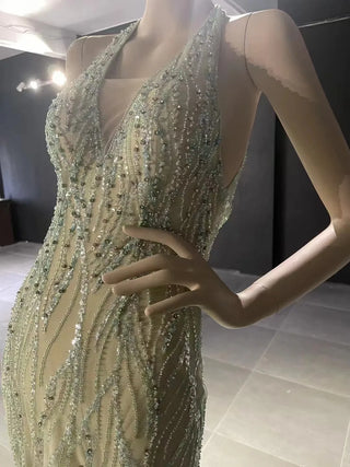 QUEENS DUBAI: Enchanting Green Elegance - Stage Costume Dress with Sexy Slit and Ostrich Feather Accents