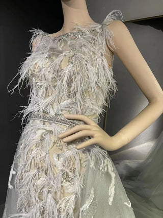 QUEENS DUBAI: Feathery Finesse - Mermaid Ostrich Feather Boat Neck Sleeveless Costume Dress with Detachable Train for a Mesmerizing Fashion Show Ensemble