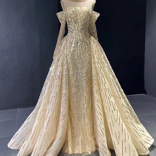 QUEENS DUBAI: Gold Sequins Long Sleeve Off-Shoulder Costume Dress - Luxury Fashion Show Evening Elegance