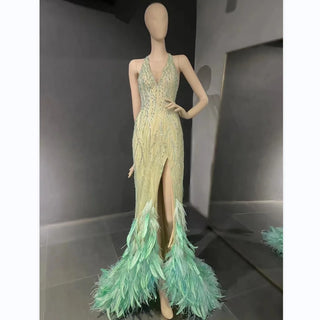 QUEENS DUBAI: Enchanting Green Elegance - Stage Costume Dress with Sexy Slit and Ostrich Feather Accents