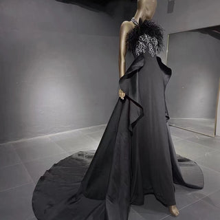 QUEENS DUBAI: Enchanting Elegance - Black Halter Costume Dress with Ostrich Feather Accents for a Fashion Show Evening