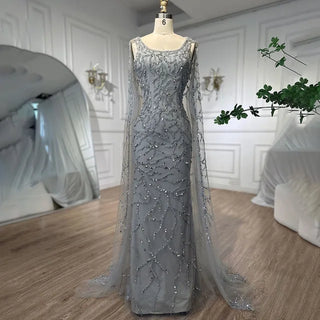 Gray Elegance: 2024 Mermaid Evening Gown with Cape Sleeves, Luxury Beading, and Arabic Inspiration