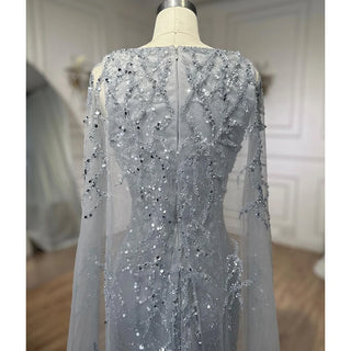 Gray Elegance: 2024 Mermaid Evening Gown with Cape Sleeves, Luxury Beading, and Arabic Inspiration