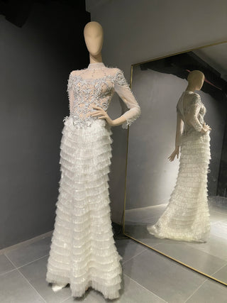 QUEENS DUBAI: Ethereal Elegance - Costume Dress with High Collar Neck, Sheer Illusion Design, Long Sleeves, Tassel Tiered Skirt, and Rhinestone Embellishments for a Mesmerizing Fashion Show Ensemble