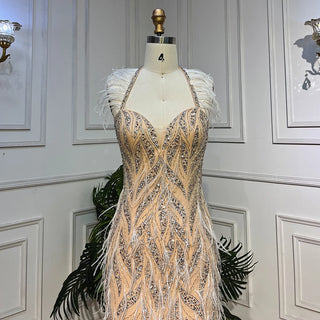 Desert Grace: Nude Mermaid Gown with Luxurious Feathers and Beads – Dubai 2024 Wedding Party Sensation