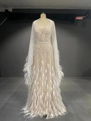 QUEENS DUBAI: Allure Unleashed - Fashion Stage Dress with Long Sleeves, Deep V Neck, Feather, and Beaded Lace for Evening Glamour