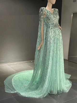 QUEENS DUBAI: Mint Marvel - A-Line V Neck Bead Rhinestone Stage Costume Dress with Cape Fashion Show Dress